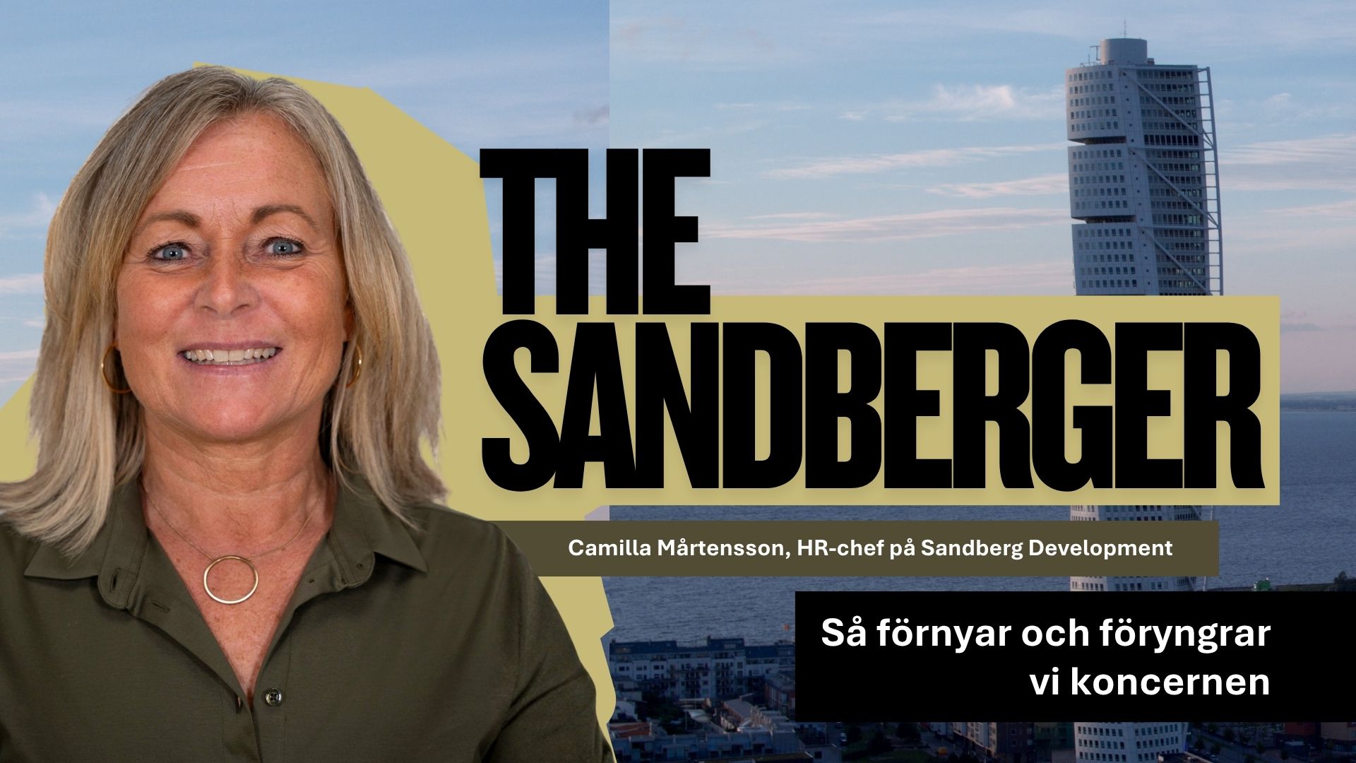 Sandberg Developments HR-chef Camilla Mårtensson frontar månadens nyhetsbrev "The Sandberger" bredvid en bild på Turning torso.